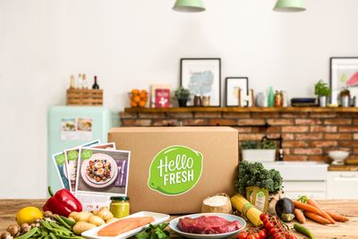 Hellofresh box on wooden table with all the food