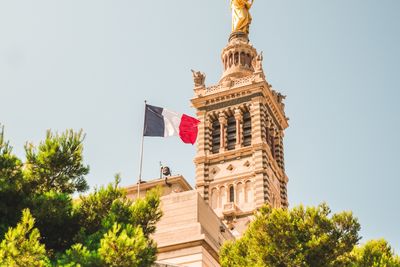 a building with the french flag