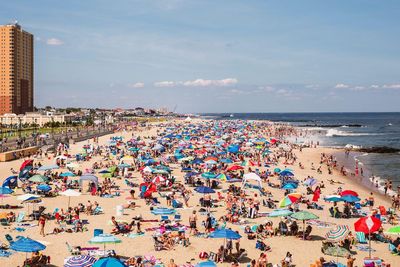 Asbury Park, New Jersey beach filled with people in the summer