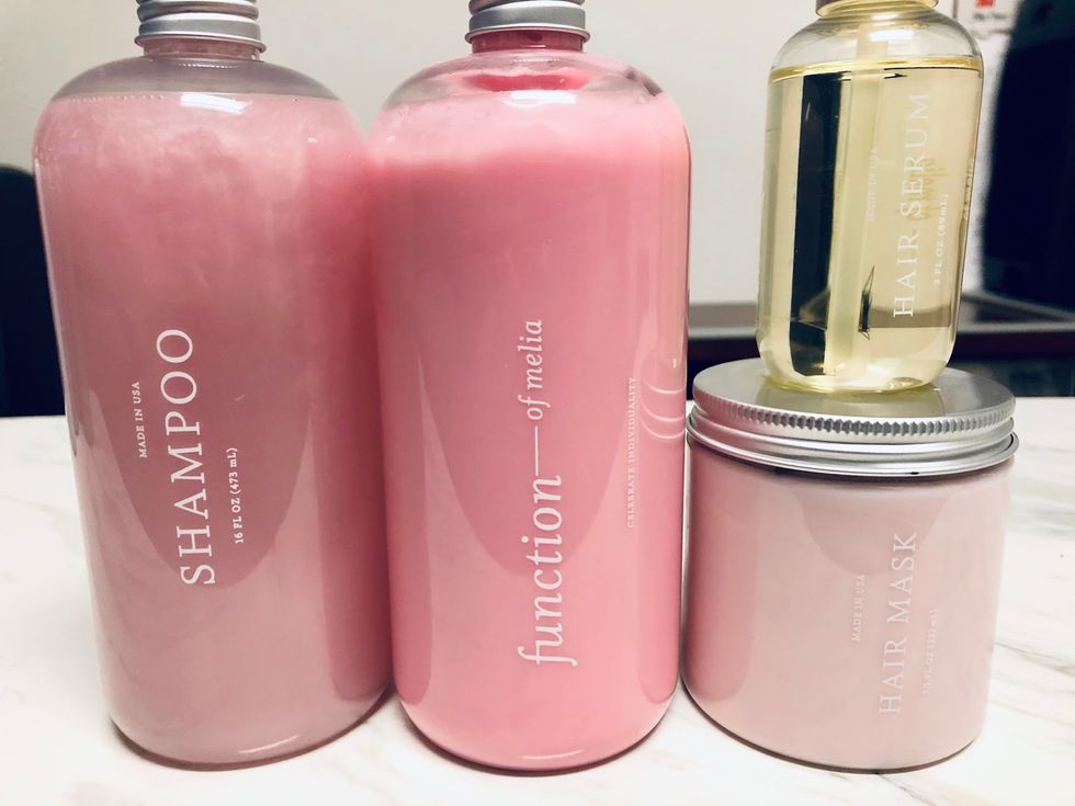 Pink Function Of Beauty Shampoo Bottle